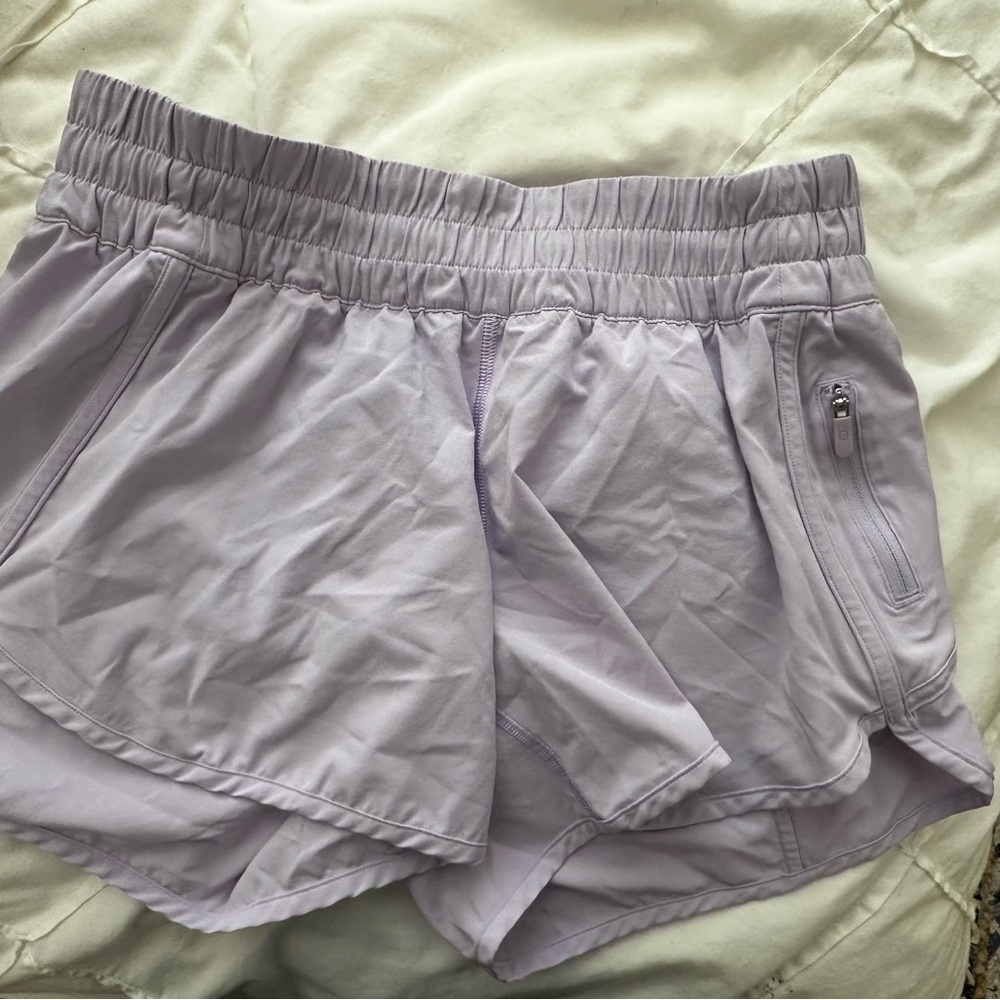 Purple Lululemon running shorts